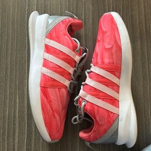 Pink adidas tennis shoes. Size 9 in women.
